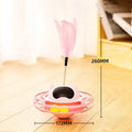 Pink cat tumbler turntable toy with self-moving rotational action for interactive feline play