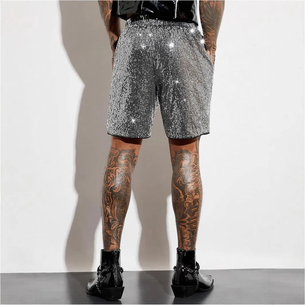 Men's silver sequin shorts with straight fit design and elastic waistband shown on hanger