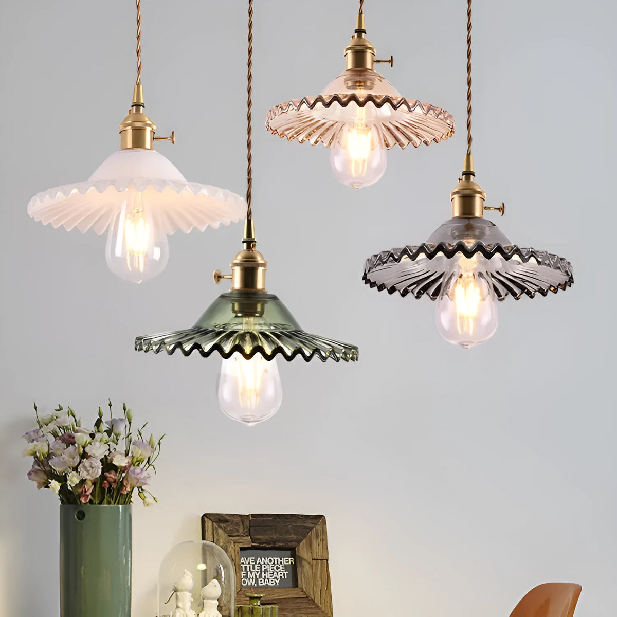 Nordic minimalist glass chandelier with copper body and black chassis, amber glass shade, adjustable height