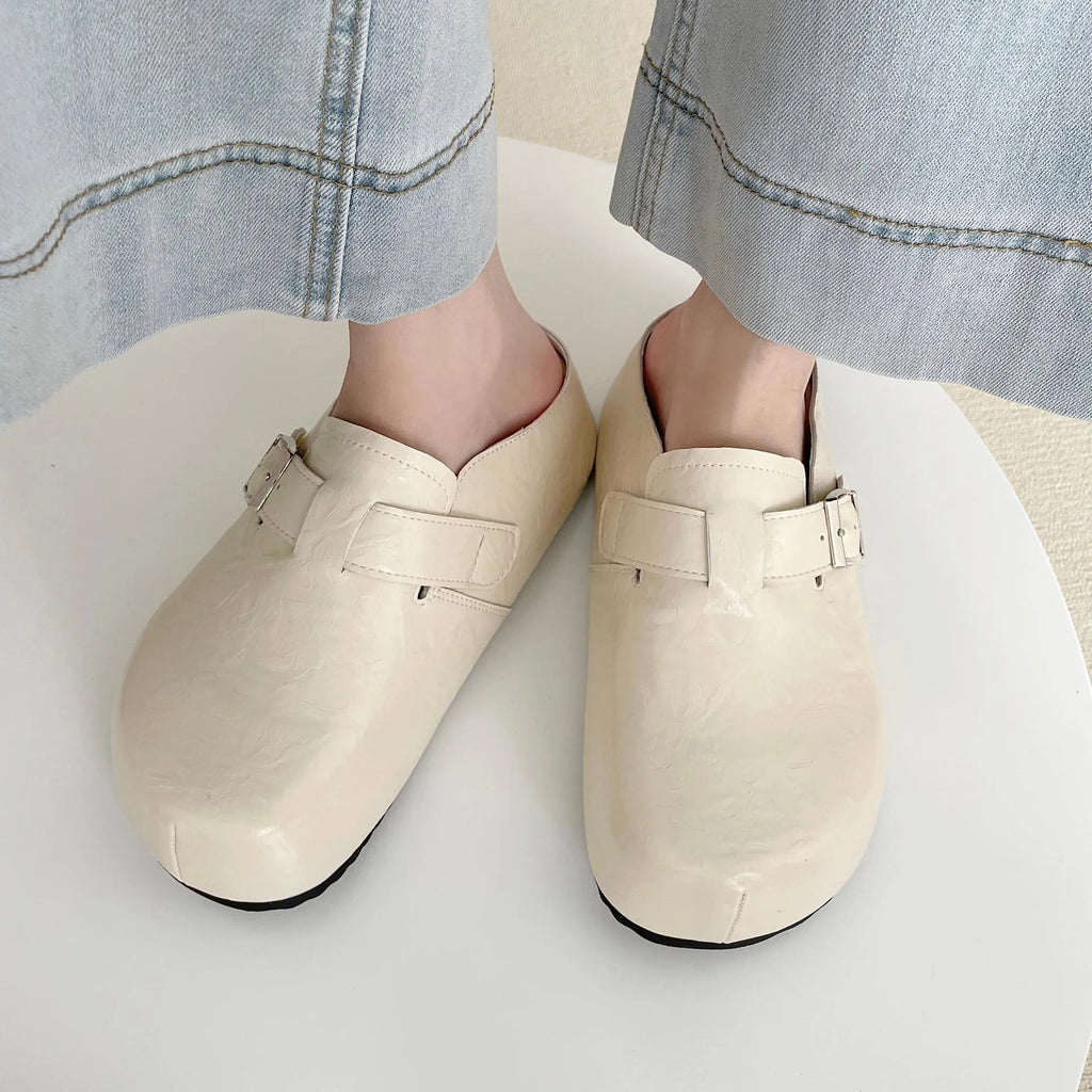 Flat buckle casual sneakers with round toe in yellow, creamy-white, silver, and black colours