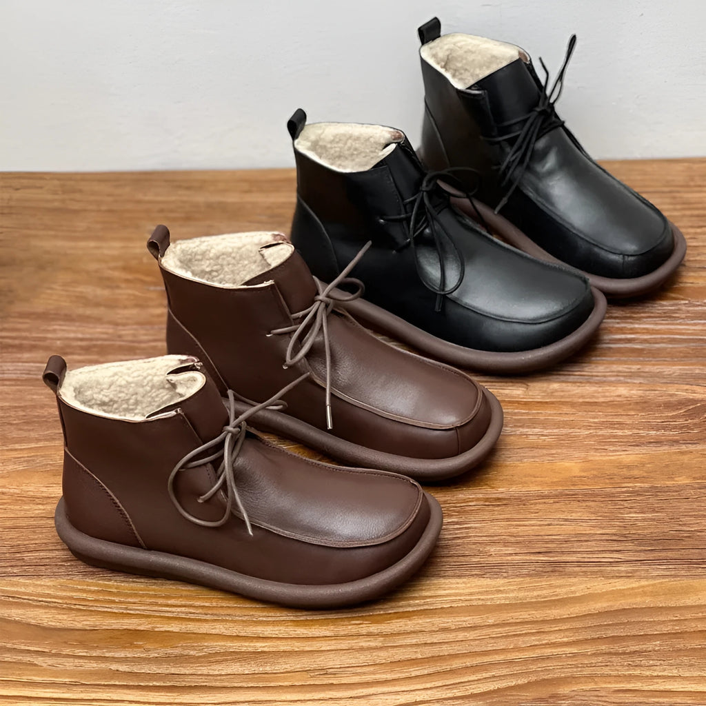 Women's cowhide boots with optional velvet lining, flat heel, round toe, and 9cm ankle sock in black and coffee colours