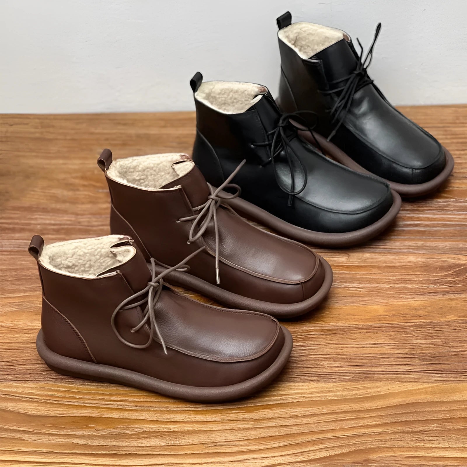 Women's cowhide boots with optional velvet lining, flat heel, round toe, and 9cm ankle sock in black and coffee colours