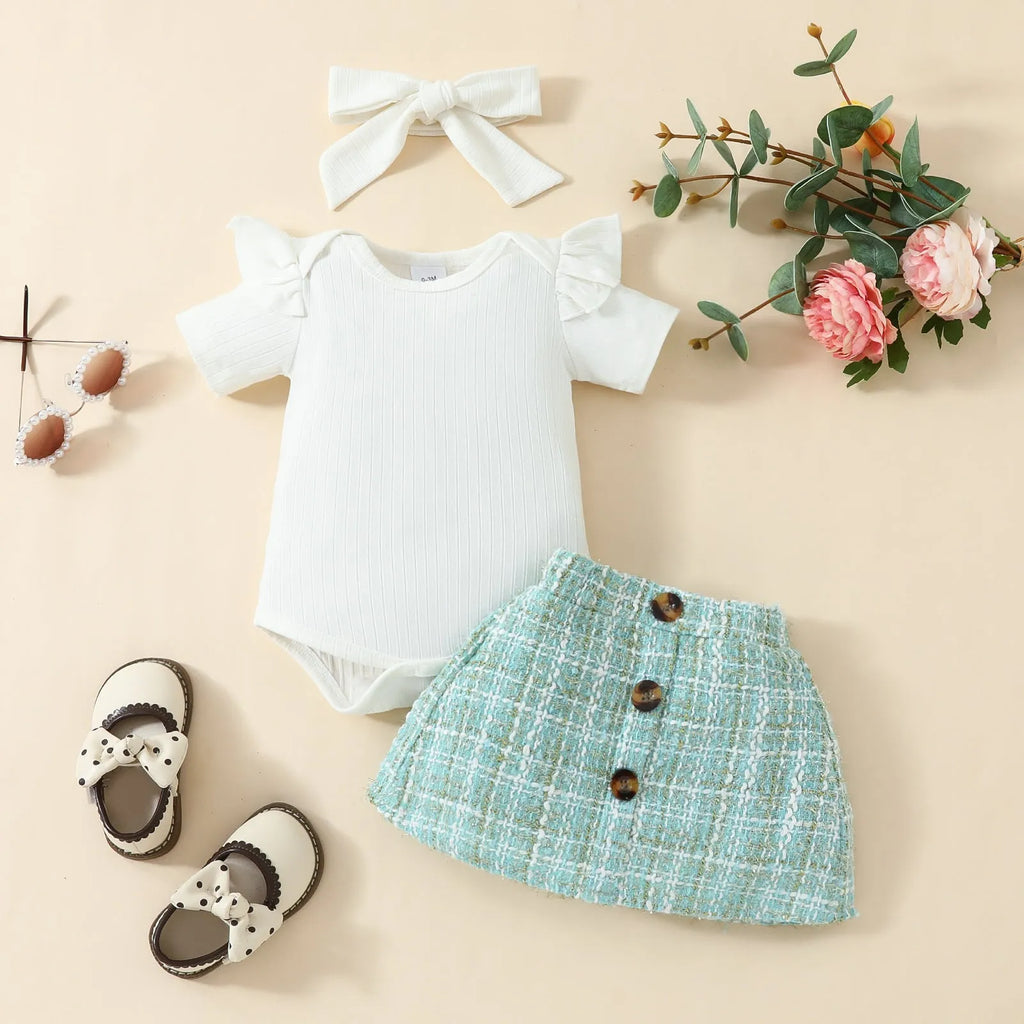 Babies' short-sleeved blouse skirt suit in black with plaid pattern, including romper, skirt and hairband