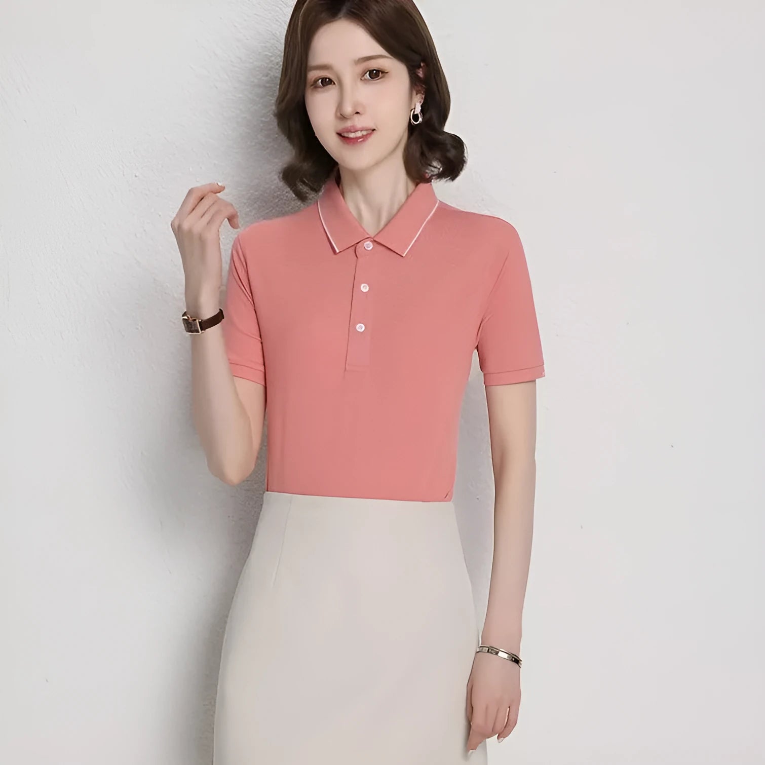 Cotton blend short sleeve polo shirt in loose fit showing colour options