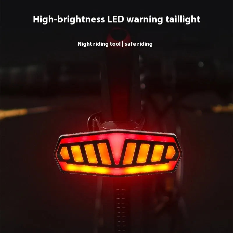 Compact black bicycle taillight with remote control on handlebars, showing left turn signal active.