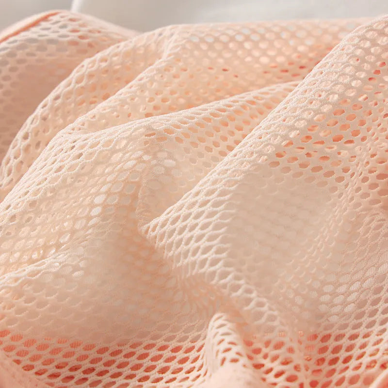 Men's mesh briefs in low waist design with elastic fabric and solid colour options