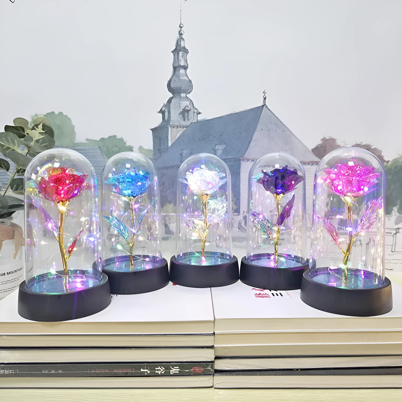 Small plastic night lamp with glass-style cover and decorative flowers, showing coloured LED light options.