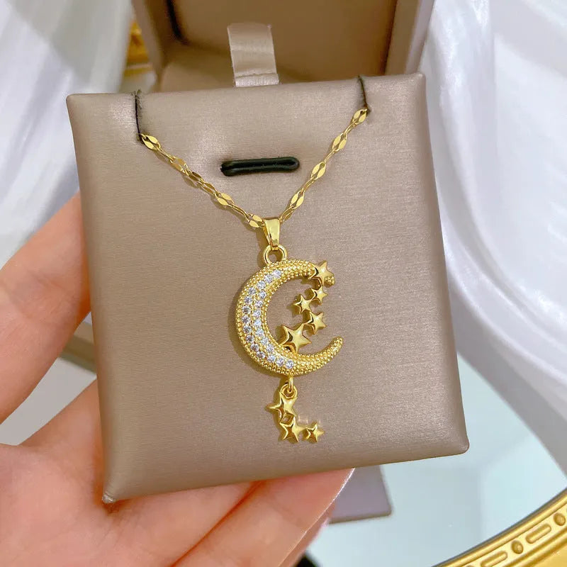 Stainless steel necklace with a copper moon pendant featuring a full diamond pattern design.
