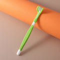 Plastic and nylon pet toothbrush in a sealed bag, colours include orange, green, and blue pink.