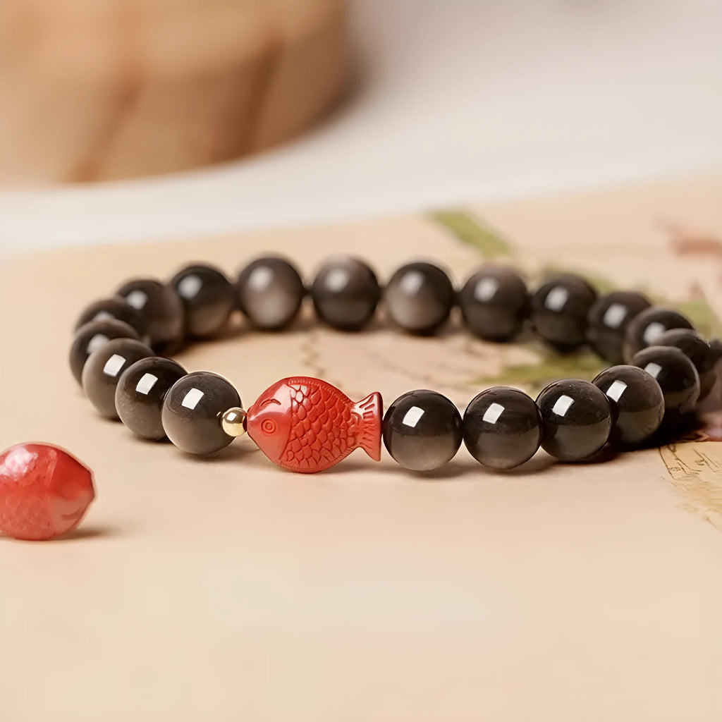 Natural obsidian round bead bracelet with red cinnabar accents and fungus decorative elements