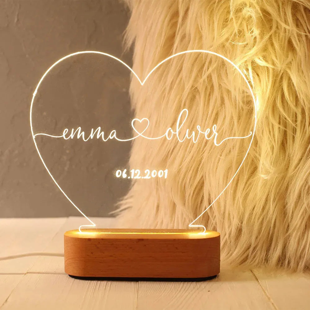 Custom acrylic night light with personalised names and date, showing dimensions of 20cm by 11.5cm.