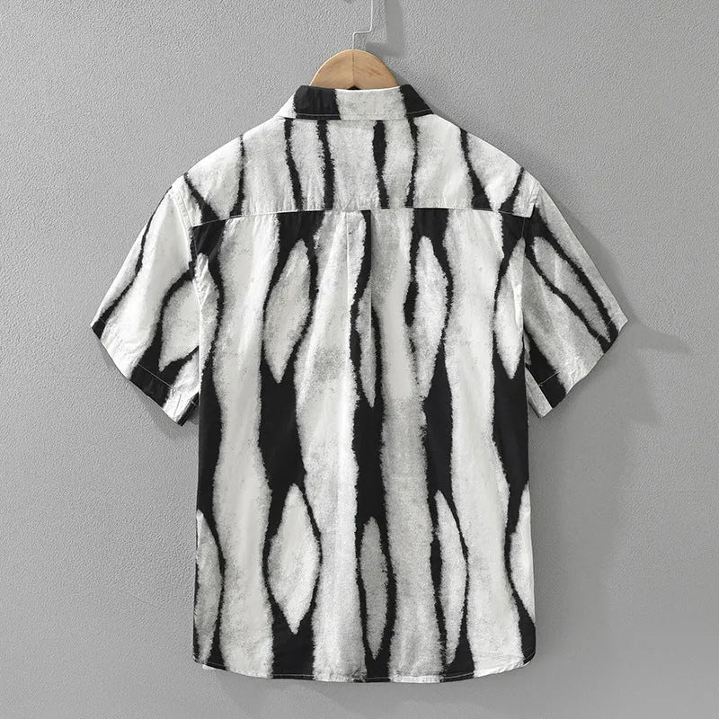 Retro striped short sleeve cotton cardigan in black, showing loose fit and button front.
