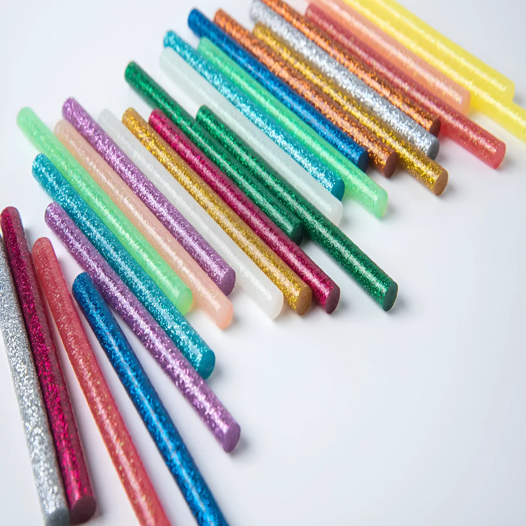 Pack of 10 colorful hot melt glue sticks with gold leaf and luminous effects, 7.2mm and 11.2mm diameters, in various lengths.