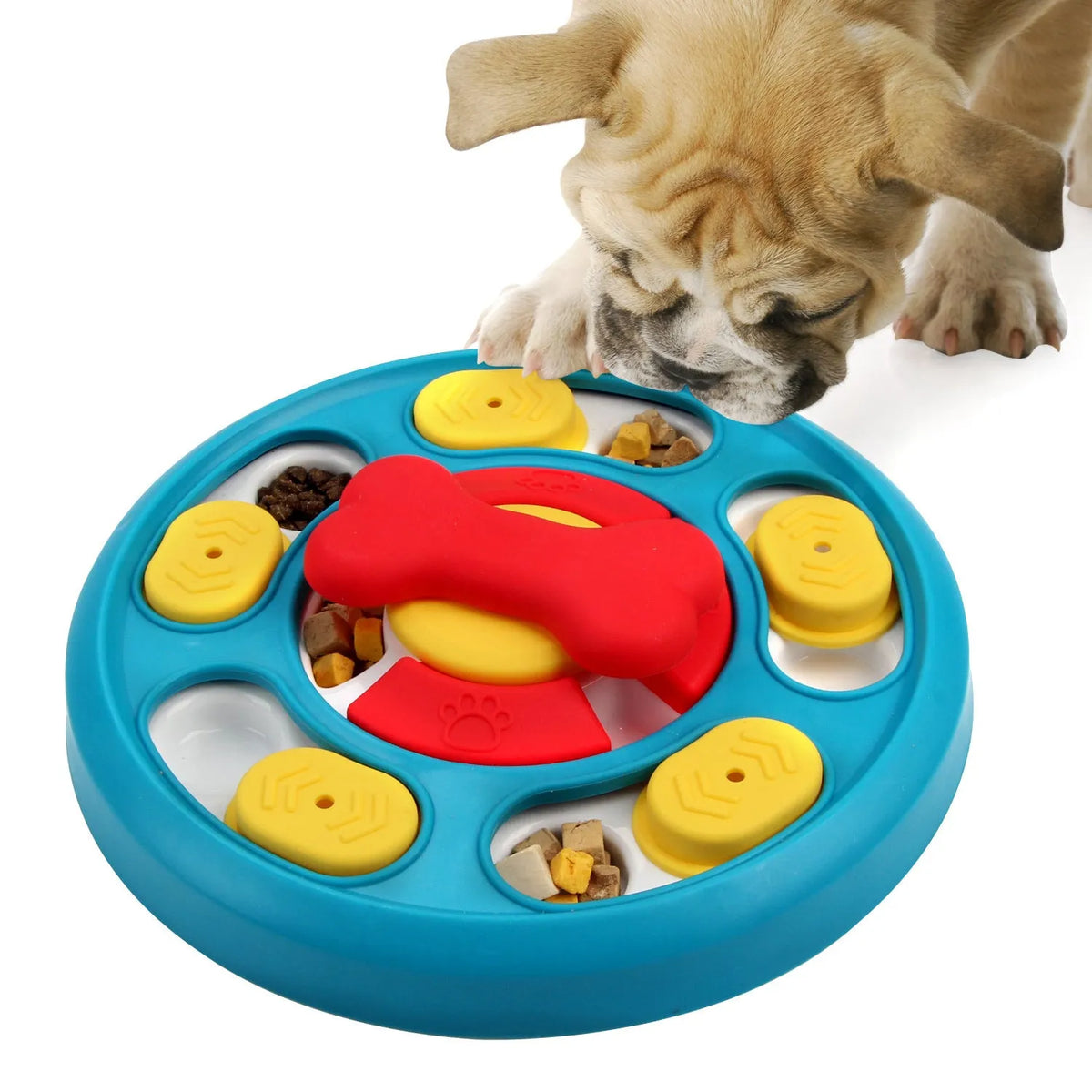 Blue plastic leak-proof feeding puzzle dog toy spinner on floor with kibble