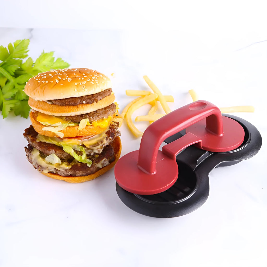 Black and red burger press gadget with non-stick moulds for making patties up to 3/4 pounds.