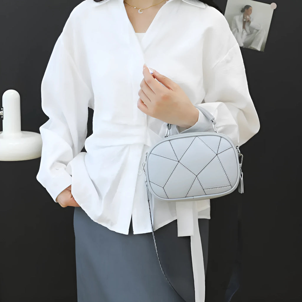 Gray three-layer patchwork small round bag with visible stitching, shown with beige, black, white, and blue colour options.