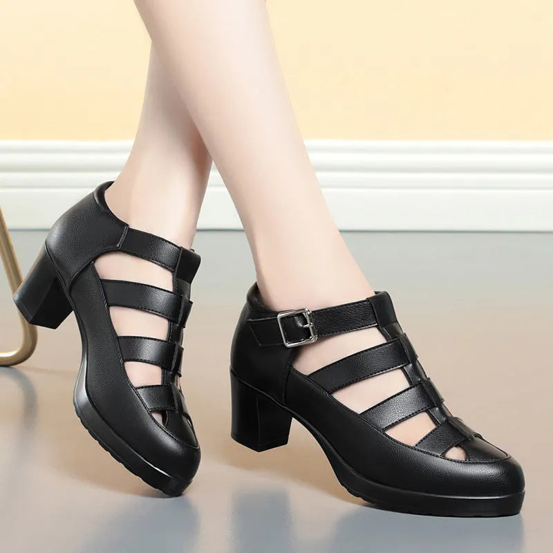 Women's beige closed toe sandals with woven hollowed design, chunky heel, and ankle-strap buckle.