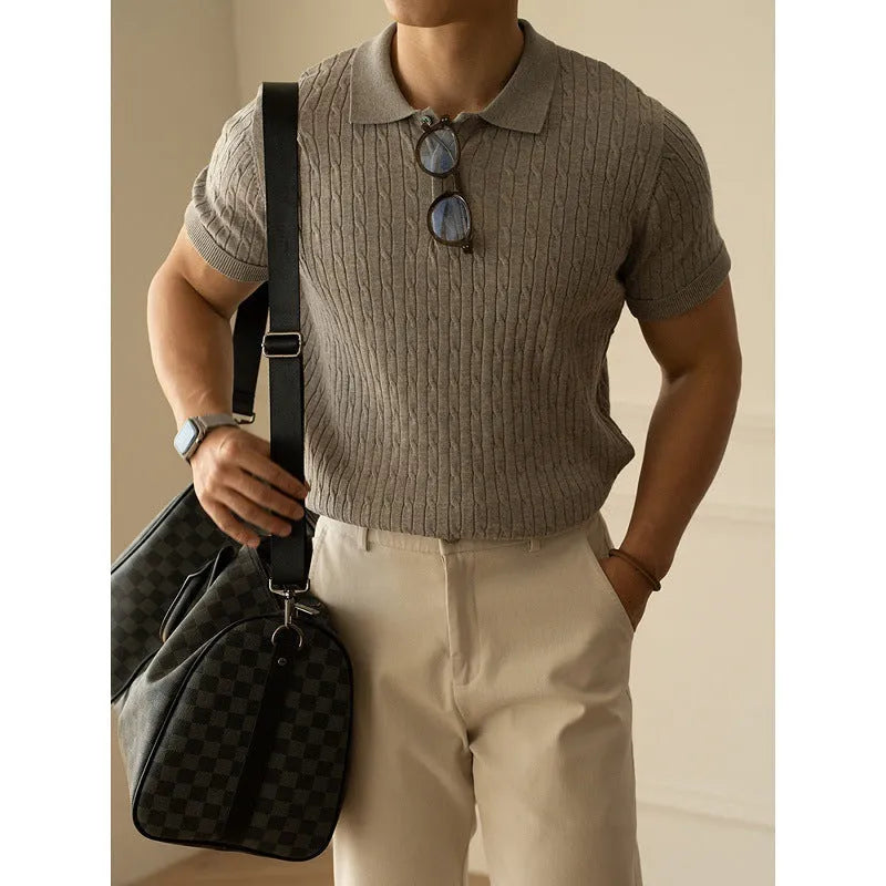 Men's khaki short sleeve business casual top on a hanger