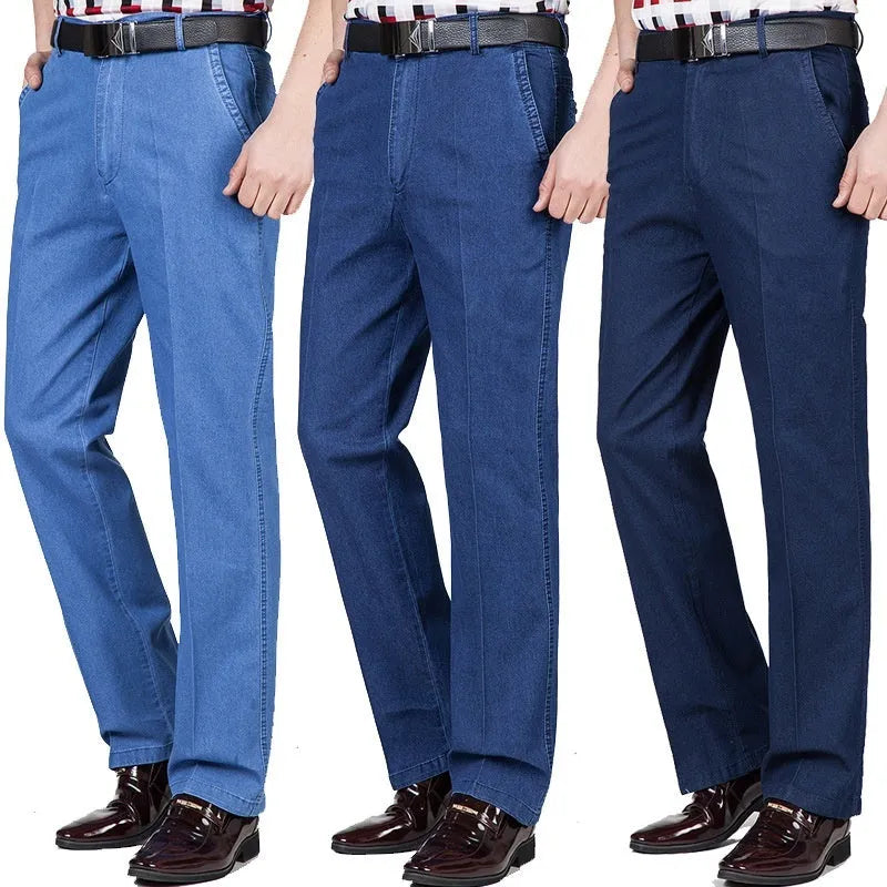 Men's high-waist loose fit blue denim jeans with zipper fly on size chart background