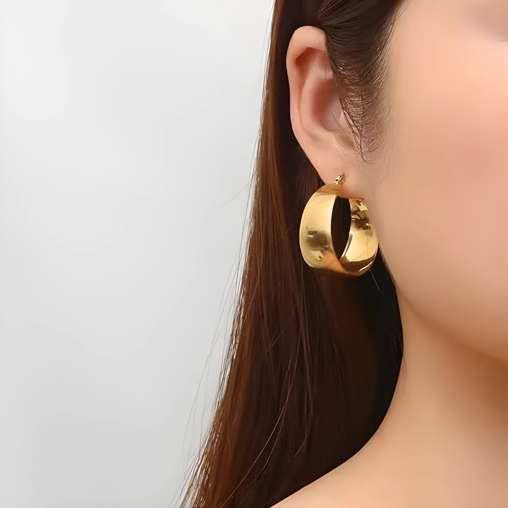Stainless steel earrings with curved ear wire in gold or steel colour, 25mm and 30mm sizes