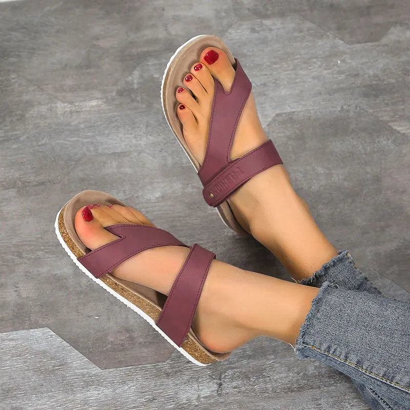 Flat toe ring thick-soled flip-flops in a solid colour with artificial PU upper and foam sole.