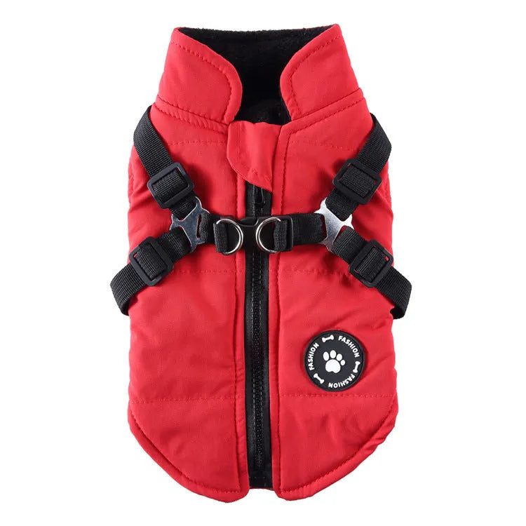 Polyester dog jacket with chest strap fastening and quilted padding in blue.