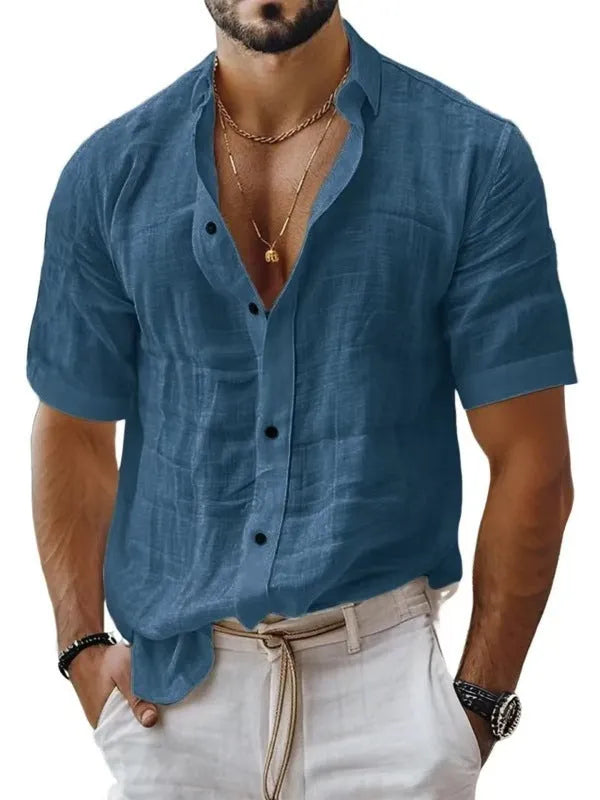 Men's solid colour short sleeve lapel shirt in light green shown on a hanger
