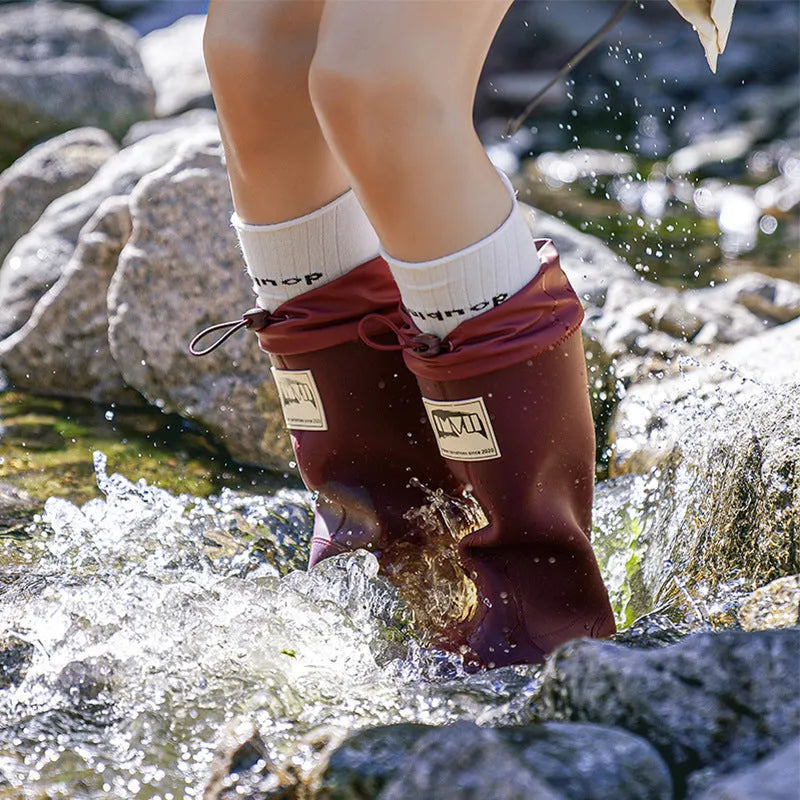 Unisex PVC platform rain boots in beige, featuring a high tube design and non-slip sole.