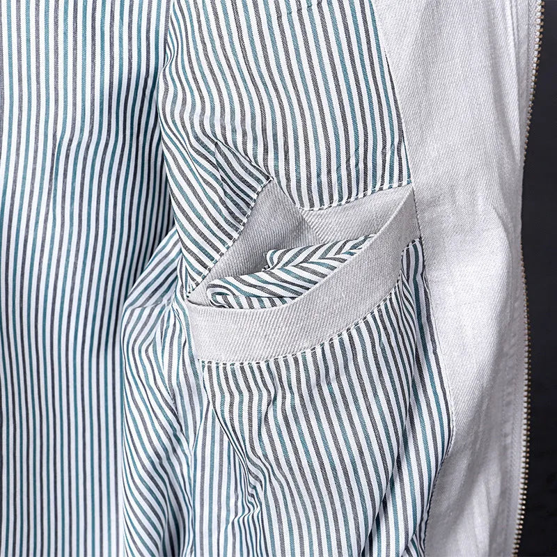 Men's lightweight blue linen jacket with a regular fit, hanging on a hanger.