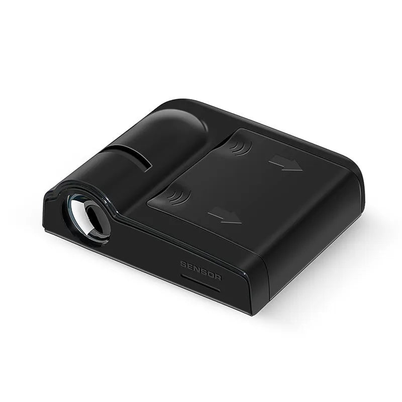 Compact black and beige ABS plastic car decorative projection radium lamp shown with AA batteries.