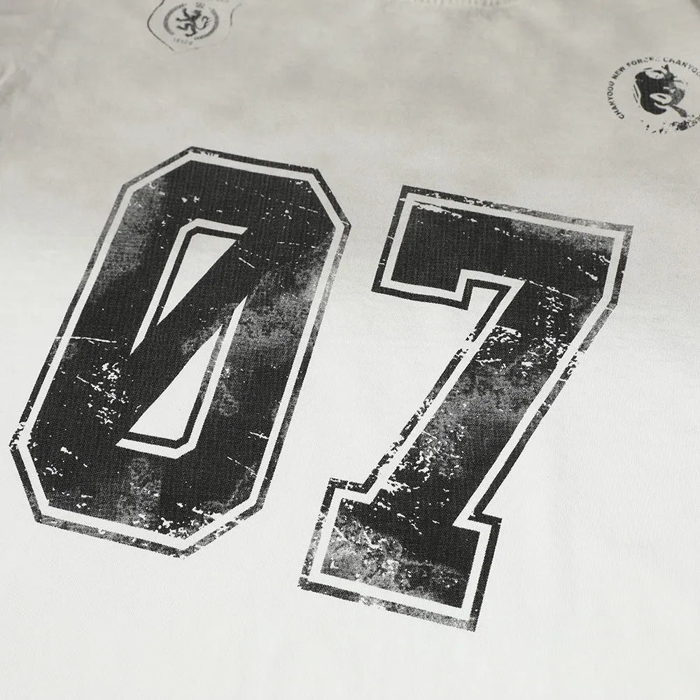 Men's black and white printed short-sleeved cotton T-shirt shown in sizes S to XL.