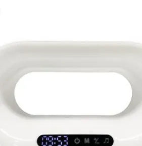 White 3-in-1 LED night light with wireless charging pad and alarm clock display