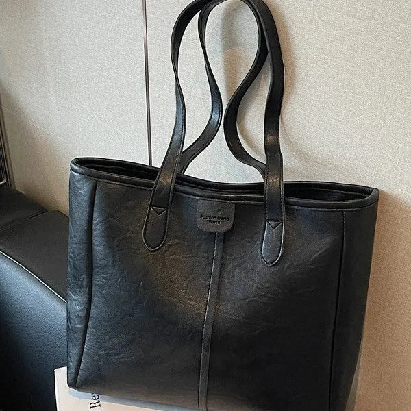 Women's large capacity PU shoulder bag in black with double straps and open top showing 37cm width and 29cm height