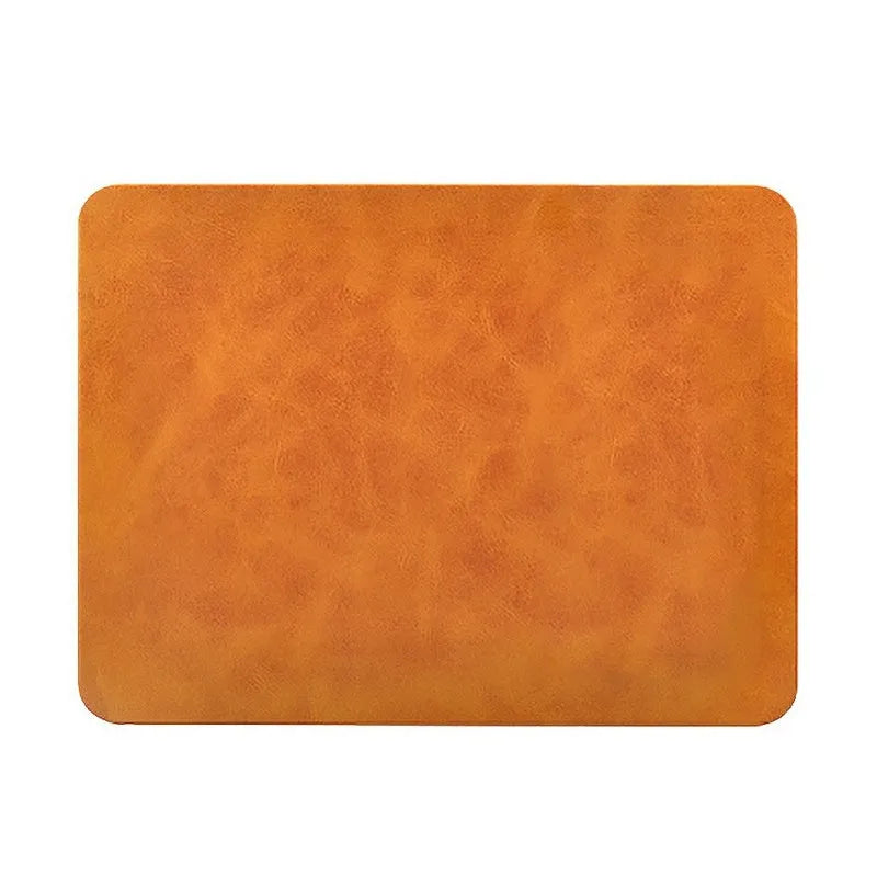 Brown leather-textured wireless charging mouse pad with Micro USB port for fast Qi charging.