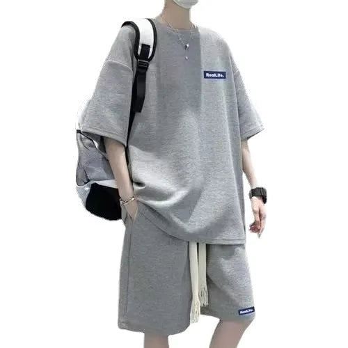 Cotton waffle texture leisure sports suit consisting of a short-sleeve top and shorts.