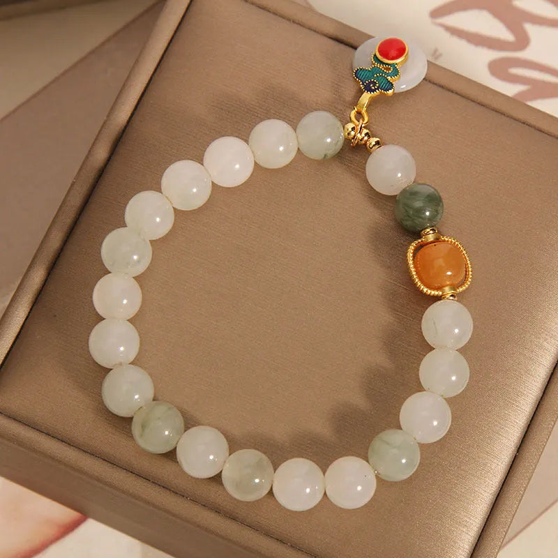 Women's ice jade bracelet with xiangyun peace buckle and pearl decorative elements