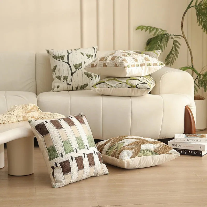45cm square jacquard cushion cover with detailed floral pattern in retro Nordic style, shown in one of eight available colours.
