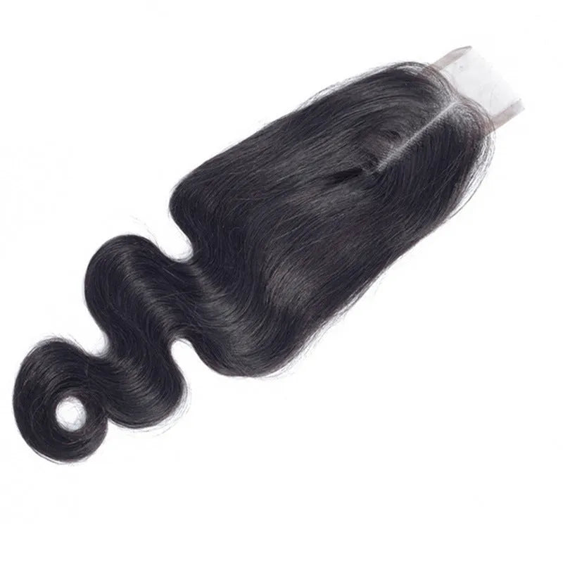 Straight natural colour human hair wig displayed on a stand, showing its length and exotic style.
