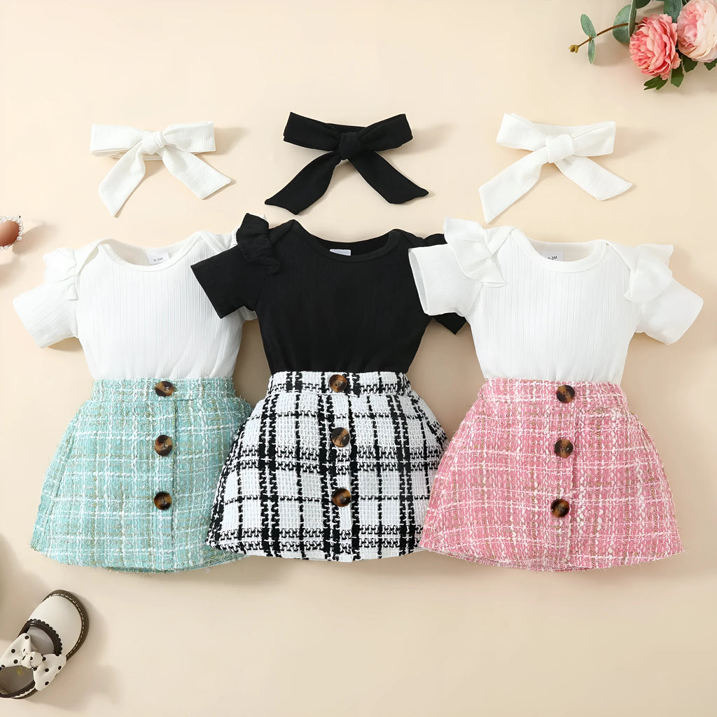Babies' short-sleeved blouse skirt suit in black with plaid pattern, including romper, skirt and hairband