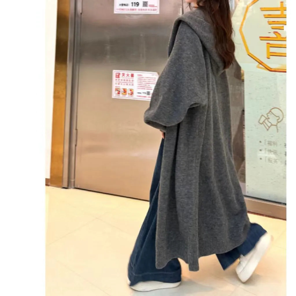Korean style long hooded cardigan for women in a wool blend fabric, shown in oatmeal colour.