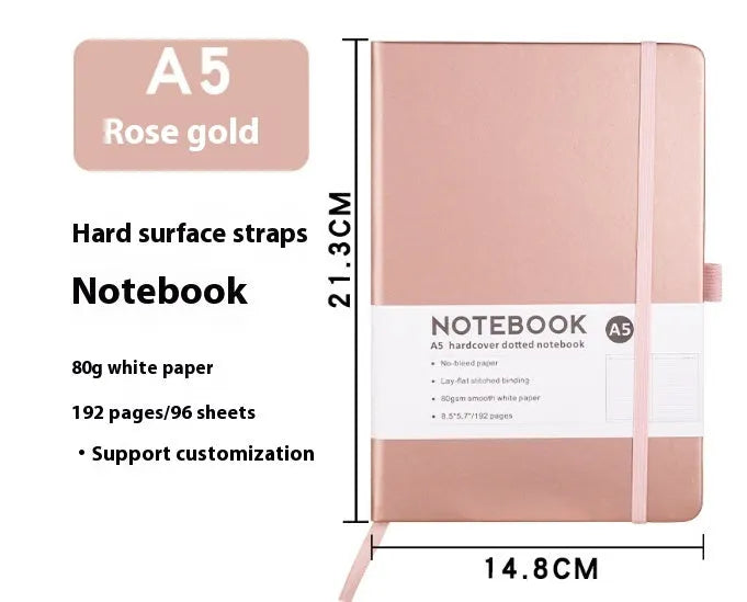 A5 soft touch PU leather strap diary open showing lined pages, closed with elastic band, in a choice of colours.