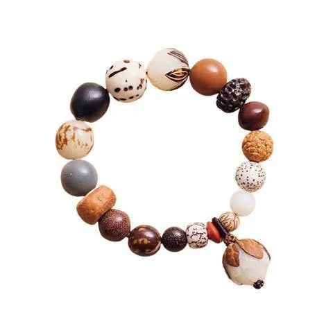 Handmade Bodhi seed bracelet with 18 natural beads in geometric pattern measuring 16cm