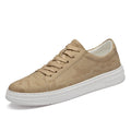White, black, or beige low-top casual sneakers with hidden platform sole, microfiber upper, front laces, and 6 cm or 8 cm height increase.