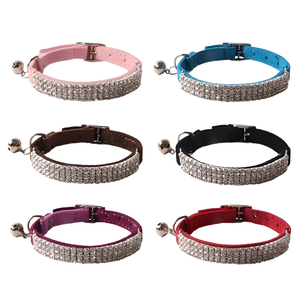 Pink flannel cat collar with elastic buckle and gang drill pattern lying flat.