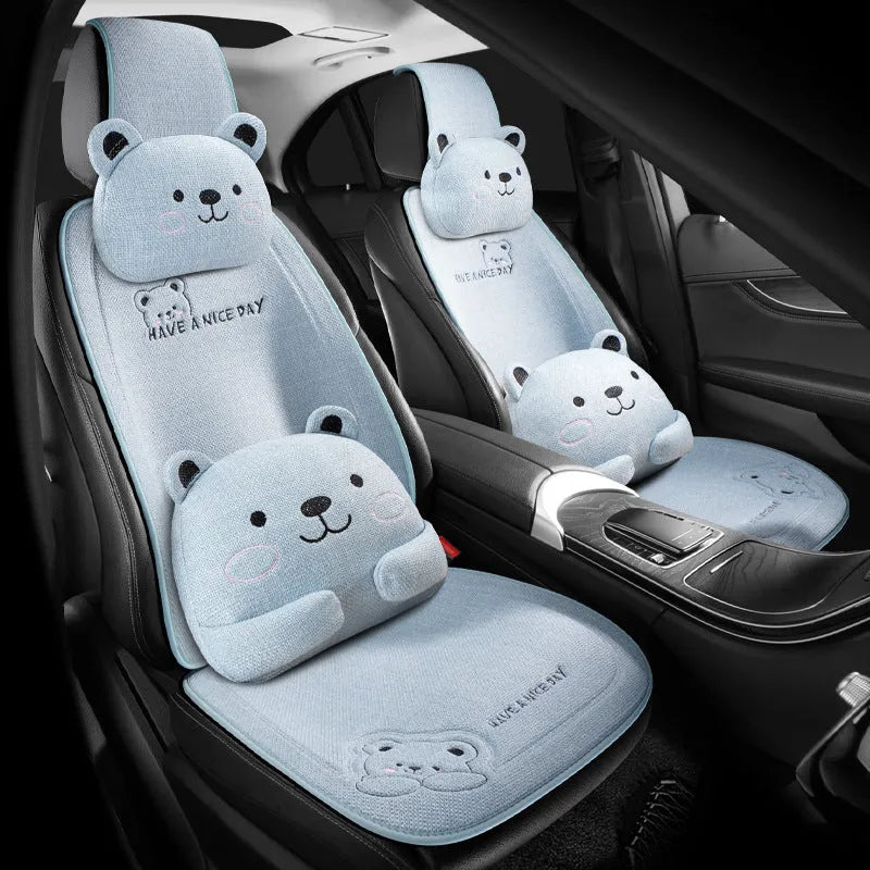 Car seat cushion set showing headrest pillow and lumbar support pillow in linen covers
