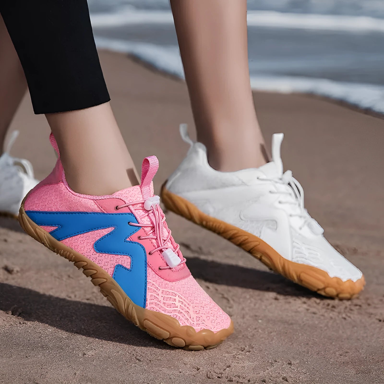 Unisex flyknit-lined climbing shoes with rubber sole in multiple colour options on a climbing hold.