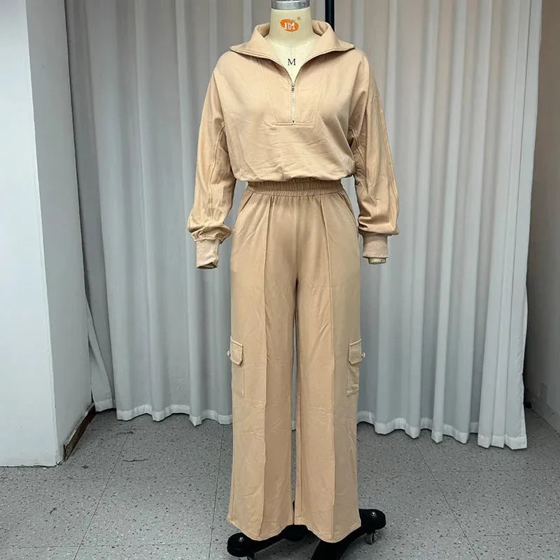 Light camel women's lapel top and wide-leg trousers two-piece workwear set on a hanger.