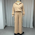 Light camel women's lapel top and wide-leg trousers two-piece workwear set on a hanger.
