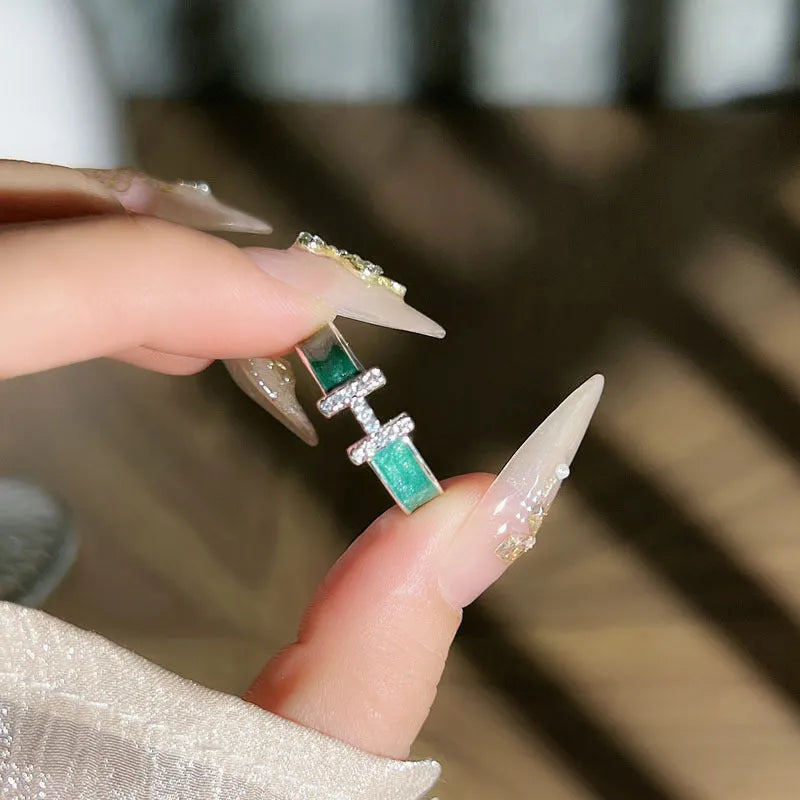 Mint green enamel asterism copper ring with folding irregular design and eight awn star elements
