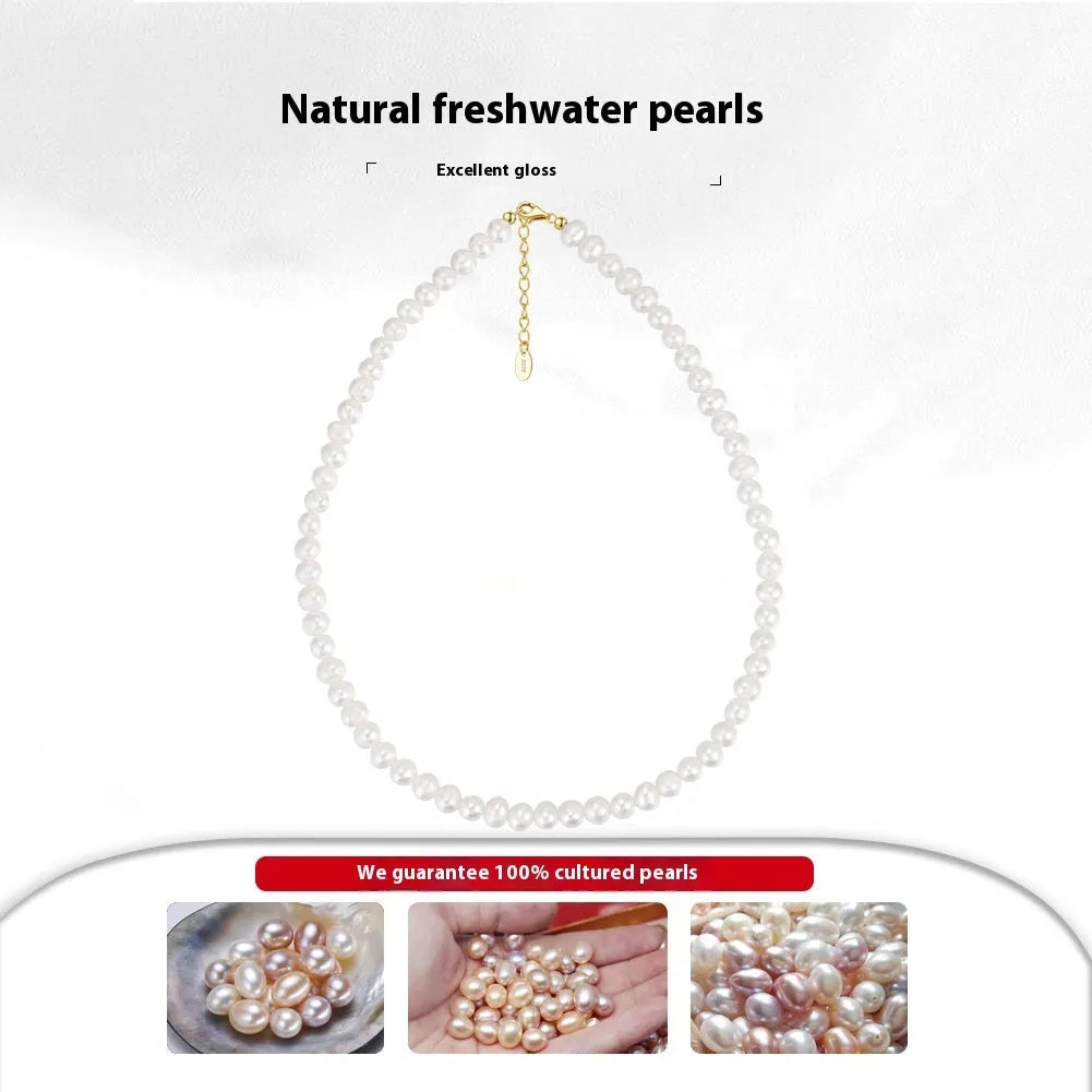 Women's adjustable silver necklace with a strand of natural freshwater pearls.